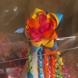 Party hats  mutilcolore  made by counting dasies . Trim is made with 100% cottob